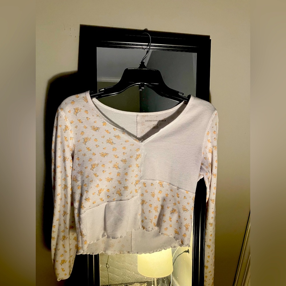 Trendy, young multicolored floral crop top.